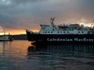 A ferry arriving in Oban in the evening.