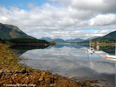 Loch Leven is like a mirror on a quiet day, from the harbour of Glencoe