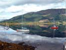 Loch Leven is like a mirror on a quiet day, from the harbour of Glencoe