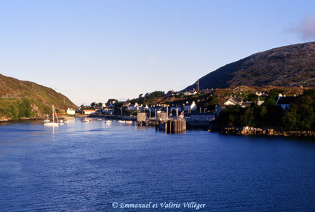 General view of the village of Tarbert leaving by the morning ferry for Uig, Skye