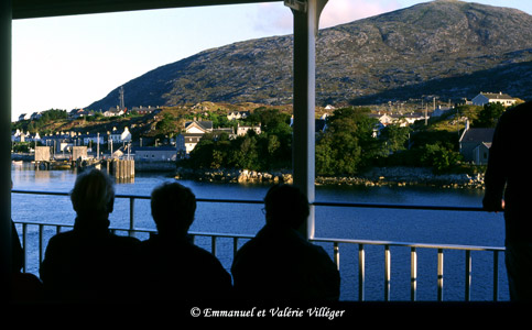 General view of the village of Tarbert leaving by the morning ferry for Uig, Skye