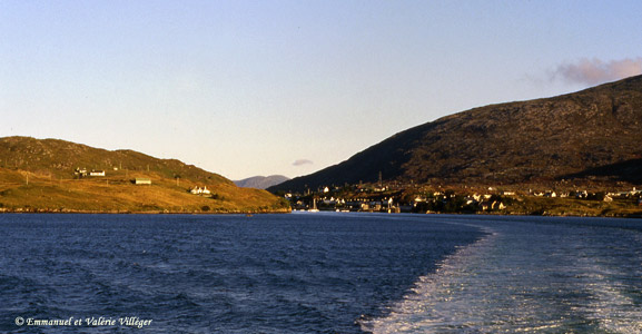 General view of the village of Tarbert leaving by the morning ferry for Uig, Skye