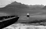 Panoramic view towards the Cuillins from Elgol, the Bella Jane is comming backl